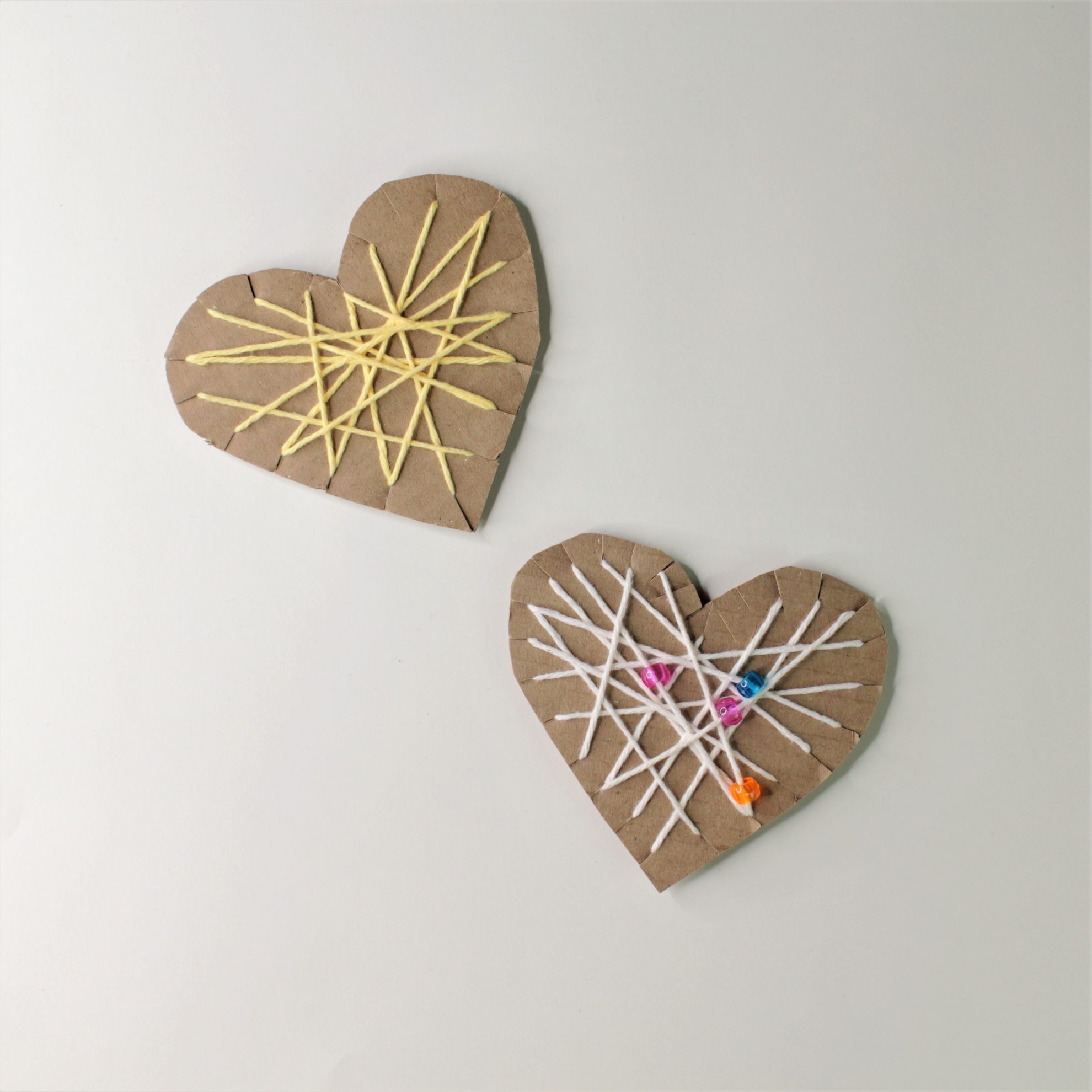 Yarn-wrapped Hearts : An Easy Cardboard Craft - Grow Good Humans