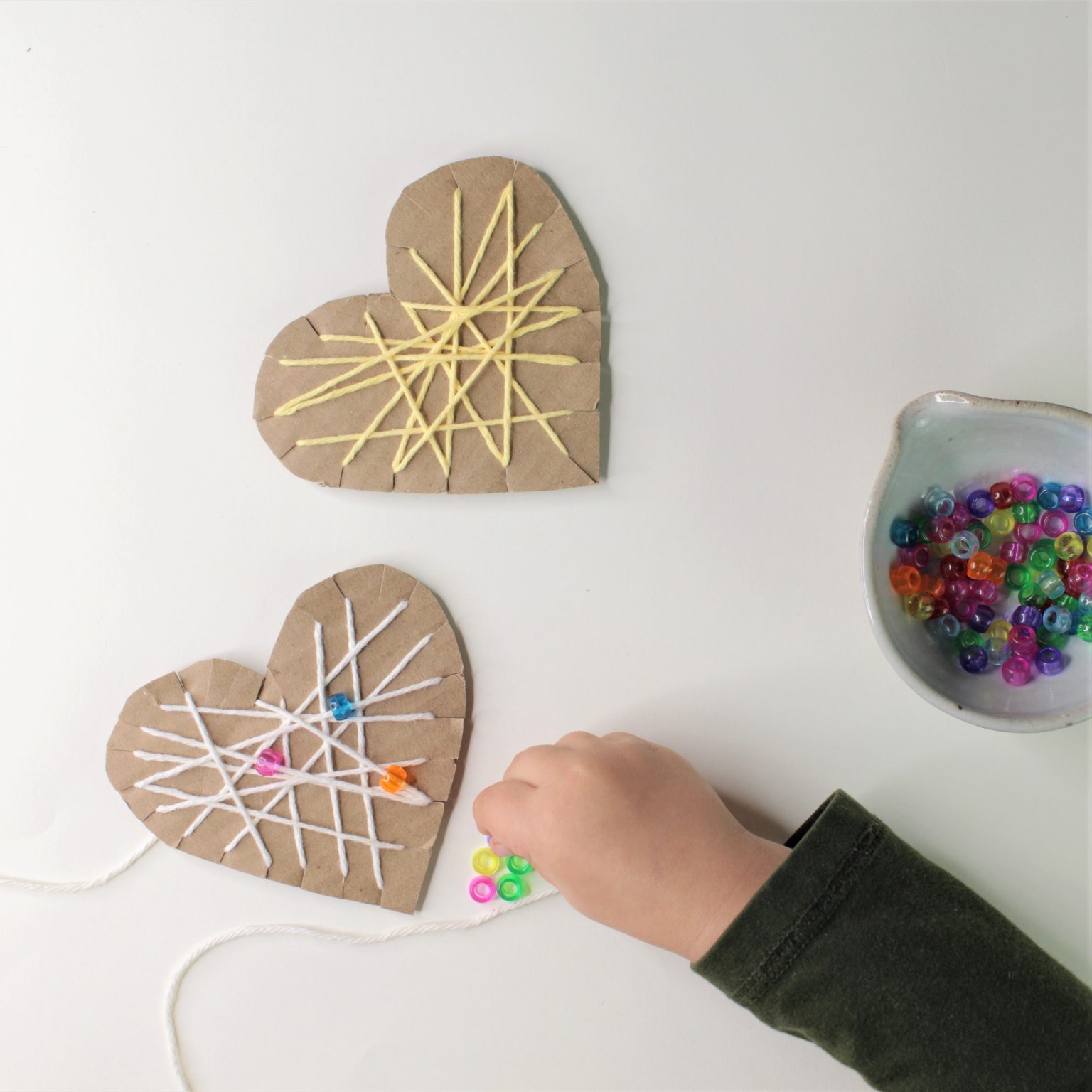 Yarn-Wrapped Hearts : An Easy Cardboard Craft - Grow Good Humans